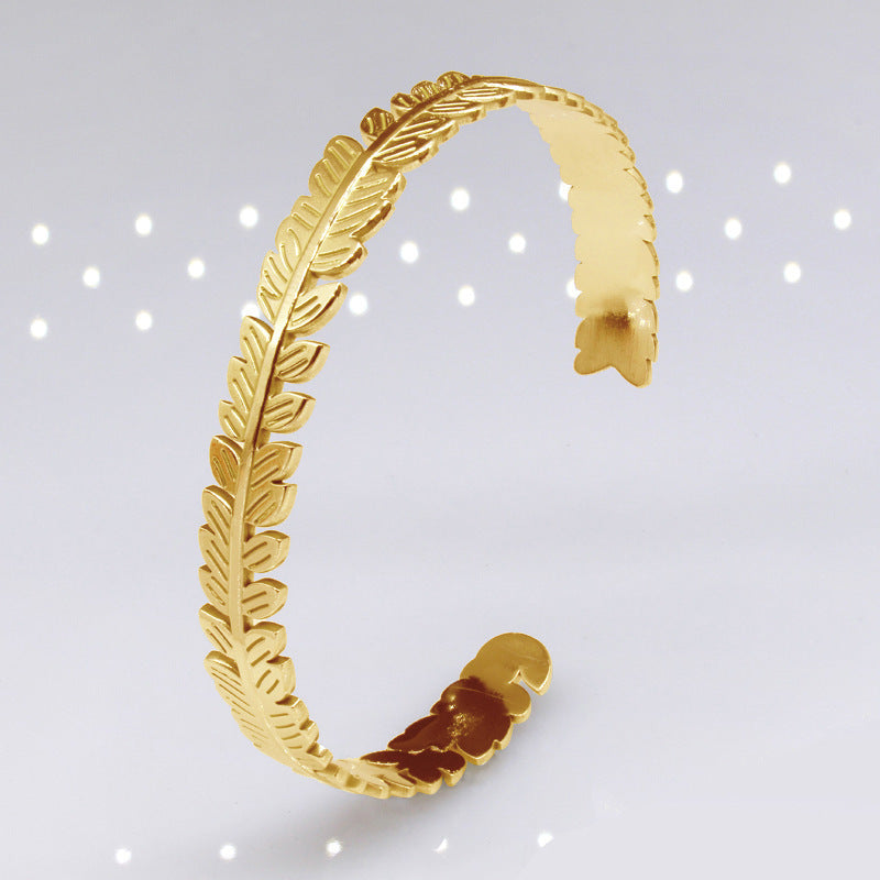 Hoja del árbol al por mayor C de forma de acero inoxidable ajustable brazalete de titanio